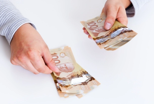 Someone exchanging CAD to GBP